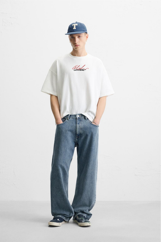 LUXVÓIRE™️ SIGNATURE SCRIPT TEE – WHITE